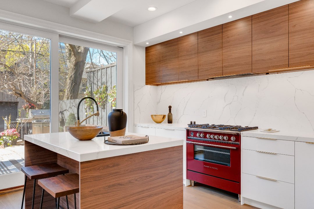 Beautiful Kitchen with Unique Red Oven and Range