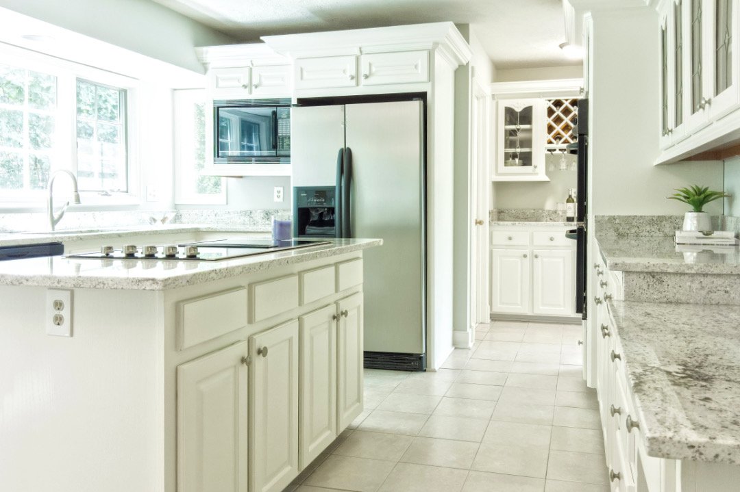 Custom Kitchen in White and Stainless Steel